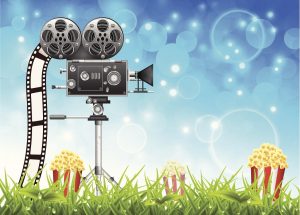 an illustration of a movie projector and popcorn under a summer sky