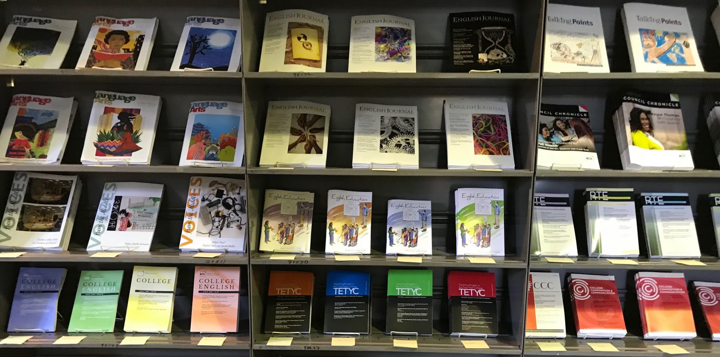 NCTE-Journals on a book shelf